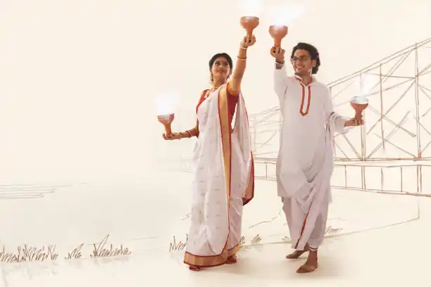 A woman and man performing with dhunuchis